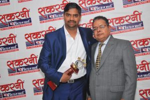 Mr. Shiju Sasidharan Receiving Award From Mr. Ashok Gupta, Chairman of Sakrni Plaster & Gipskartion India Pvt Ltd, New Delhi, 2019