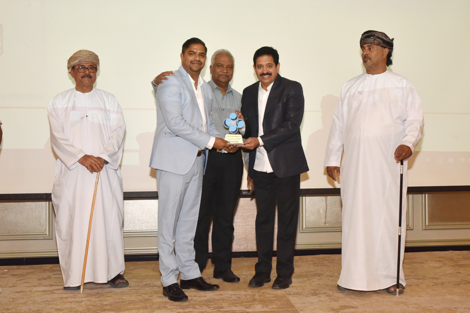 Mr. Shiju Sasiharan receiving a memento from renowned Indian personality Shri. Gopinath Muthukad, inthe presence of Dr. Santhanan, Consular Officer, Embassy of India, Salalah.