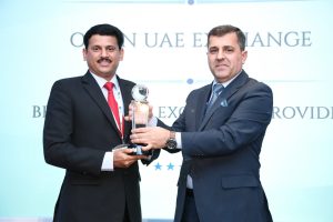 Boban Madamana Pailo receives the Best Remittance Provider Award in Dubai.