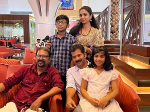 With Malayalam Mission Chairman and Celebrated Poet Murukan Kattakada, a moment of literary pride and cultural connection with family.