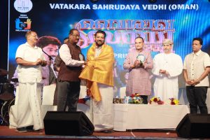 Mr. Suresh A.M Honoring member of parliament Mr Shafi parambil